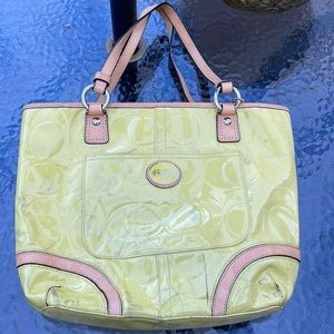 Lime green coach purse and wallet together